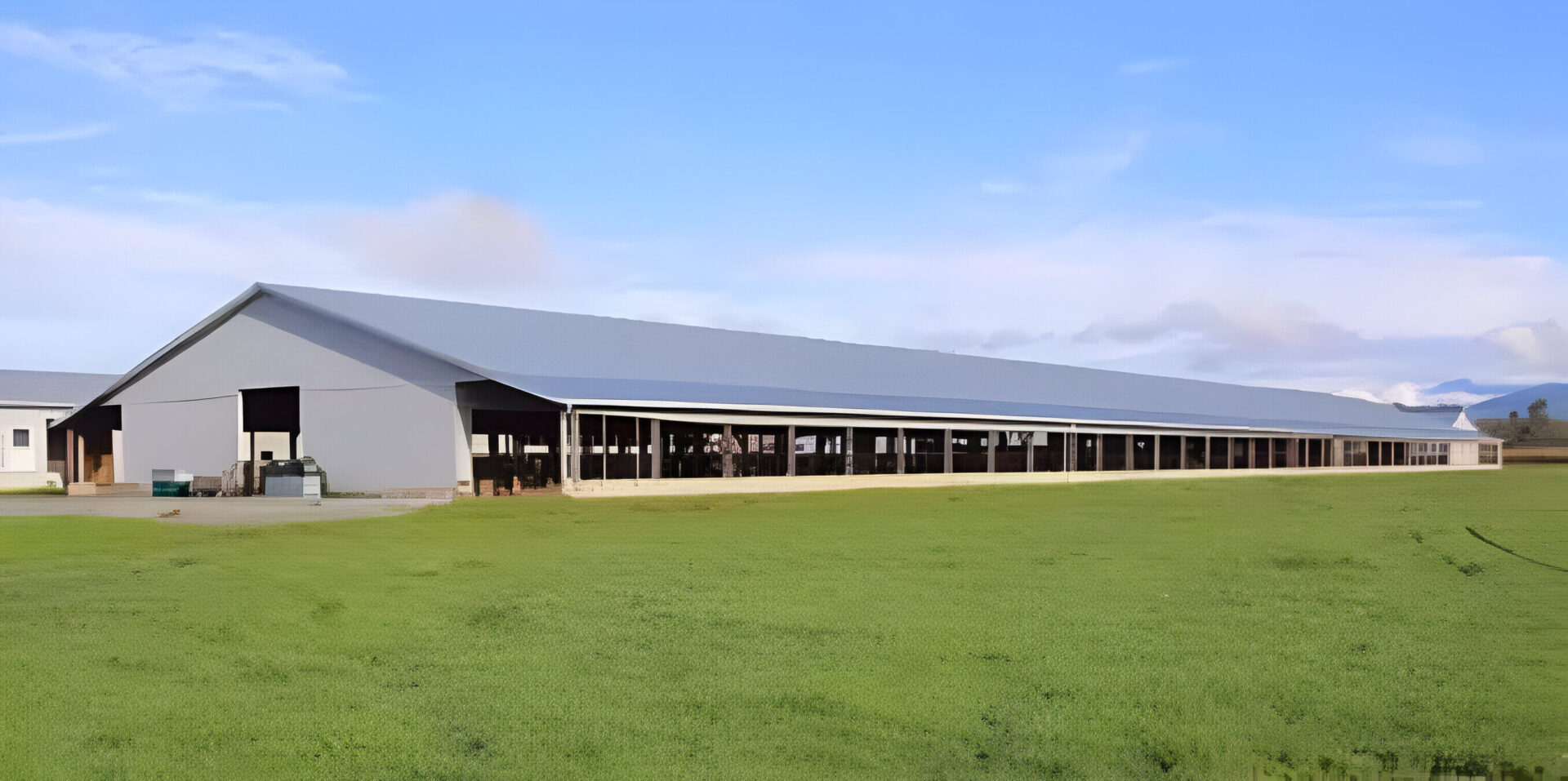 A large building with many windows and doors.