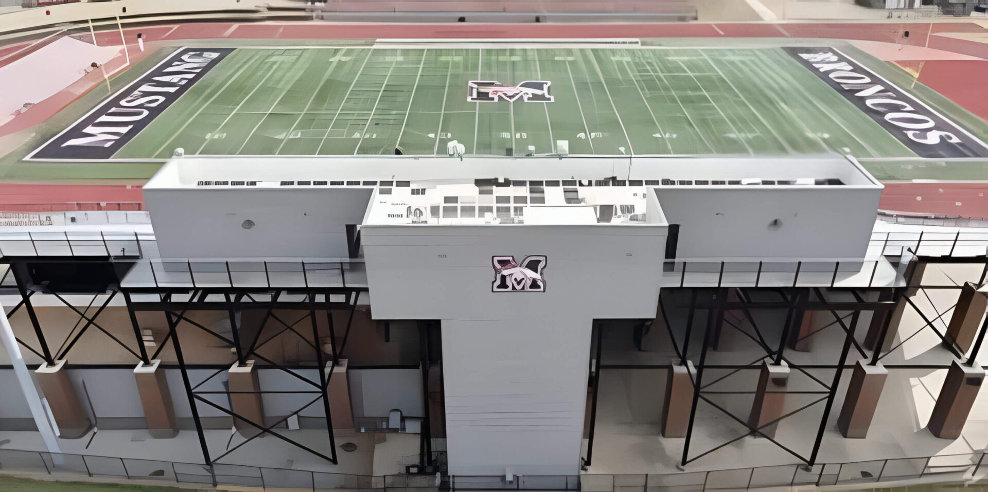 A football field with no fans in the stands.